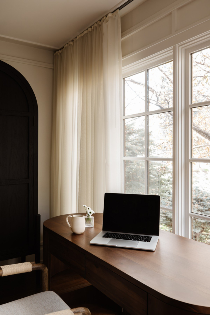 a laptop sitting on a desk